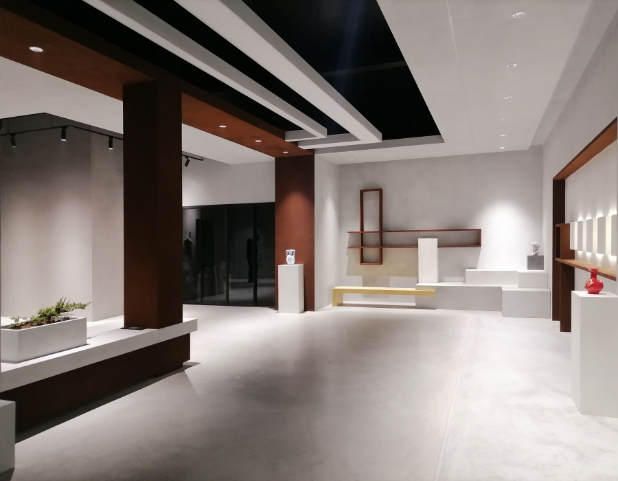 Skyconcrete® Indoor, pavimento effetto nuvolato basso spessore finitura light gray. China Exhibition Hall, Pechino. Progetto: Arch. Hailiang Hui