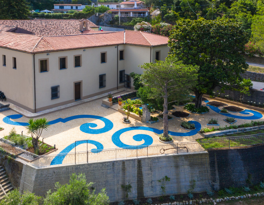 ItalianTerrazzo®, exposed aggregate paving giallo ocra and blu oltremare color. Giardino delle Arti, Maratea (Italy) Project Arch. Francesco Canestrini. 01