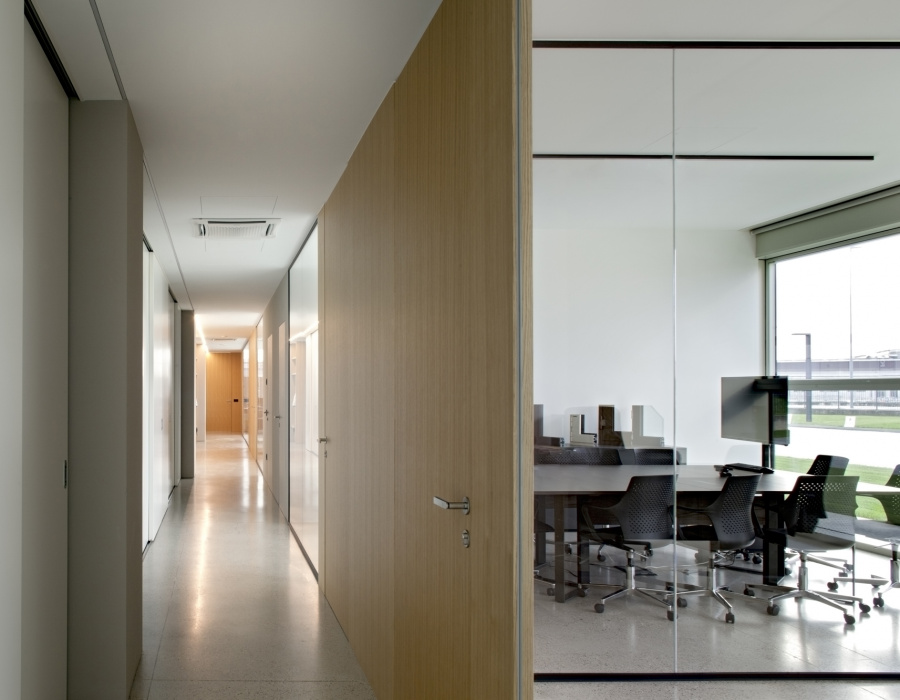 Pavilux, pavimento industriale colore cemento, Vettoretti Workshop Caerano di San Marco (TV) Progetto: REISARCHITETTURA