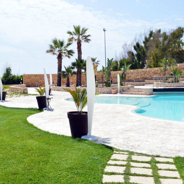 Plam Stampable, stamped concrete floor white color, tawny shades. Hotel Capo Campolato, Siracusa, Italy