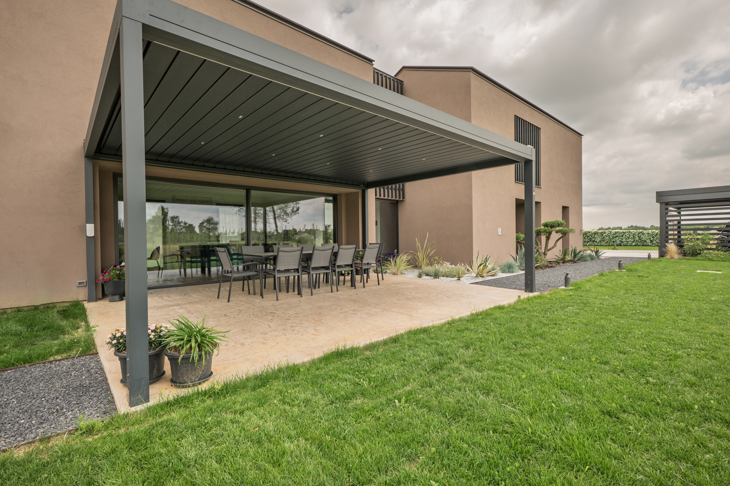 Pavimento in cemento stampato Plam Stampable Isoplam – Santa Maria di Sala, arch. Simone Gastaldella