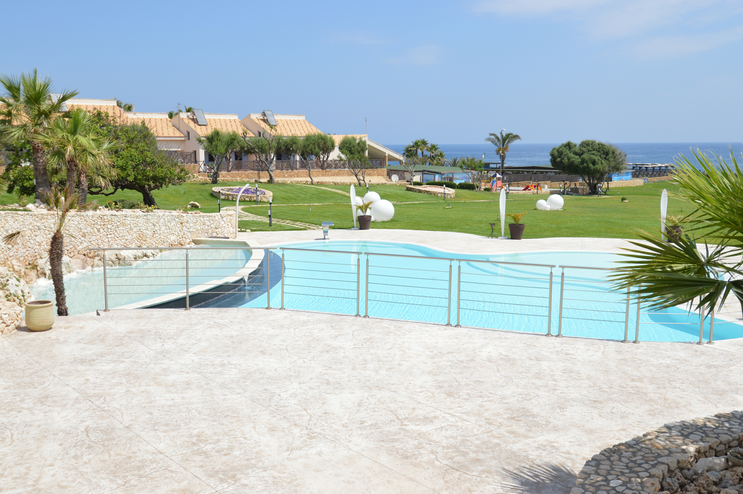 pavimento in calcestruzzo stampato per hotel residence baia del silenzio sicilia