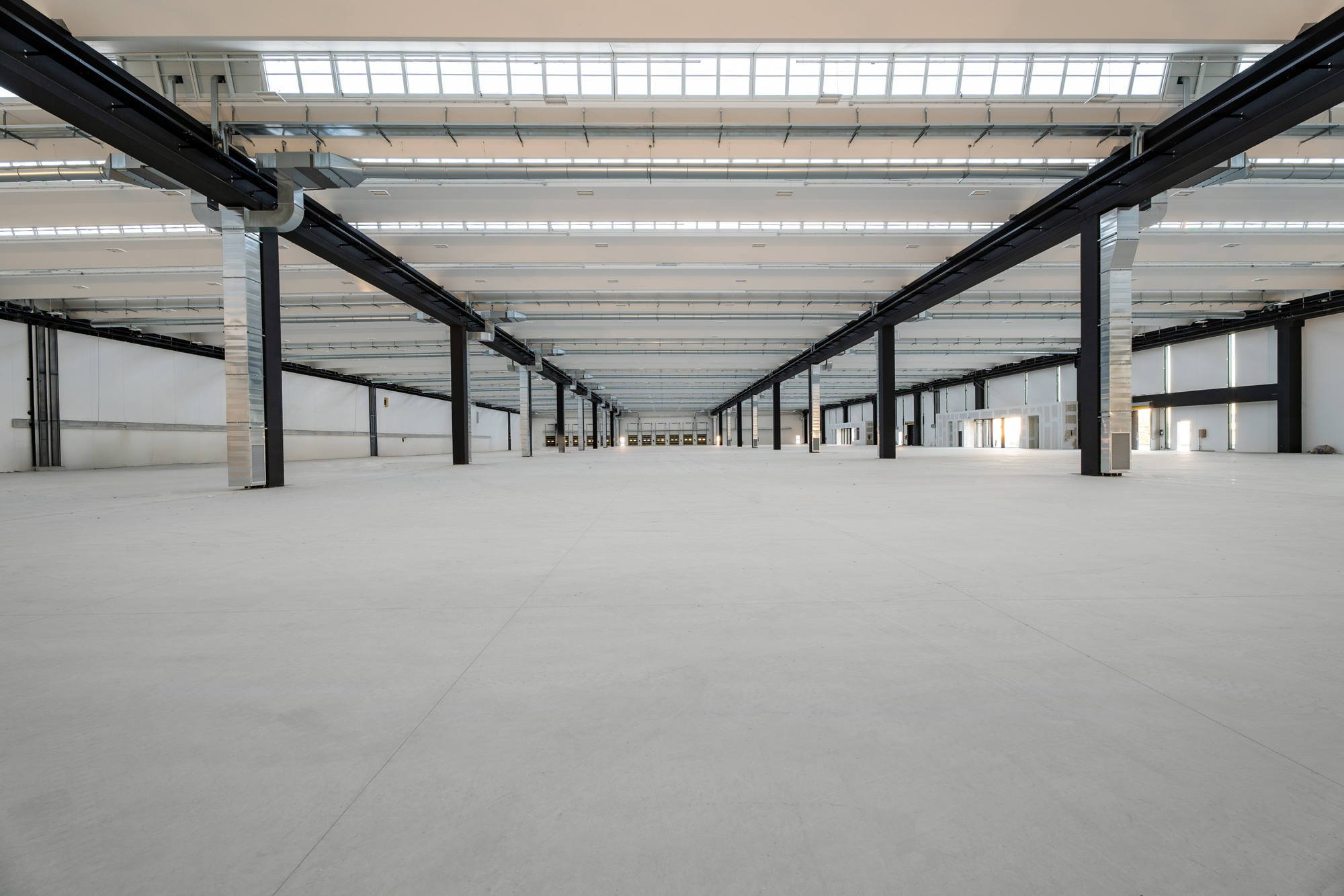 Area produttiva Unox City con pavimentazione industriale in calcestruzzo con spolvero al quarzo Pavilux Crystalquarz